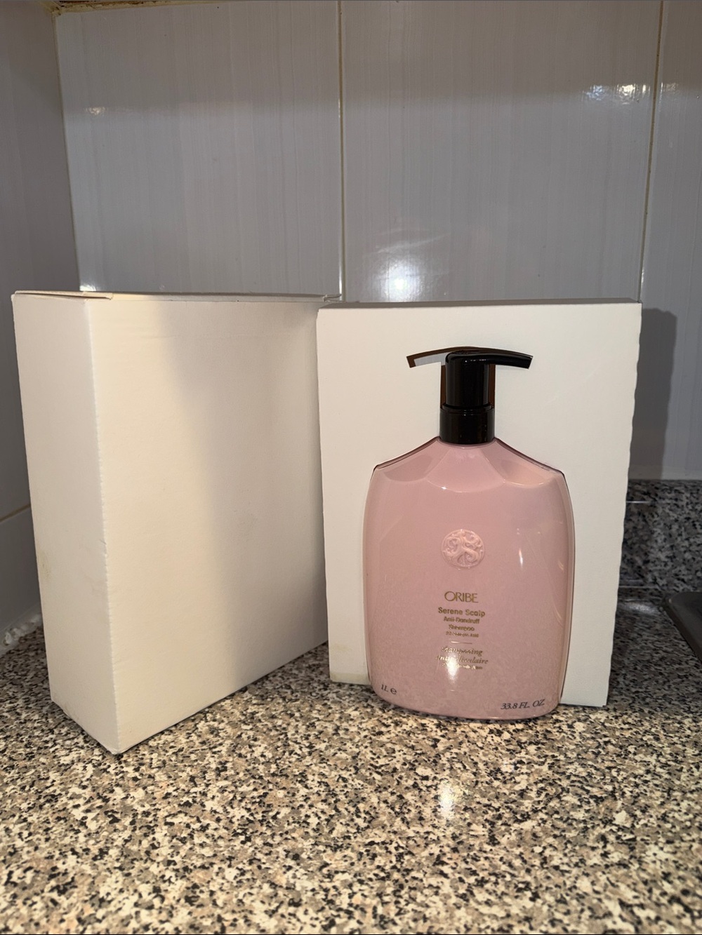 Oribe Serene Scalp Shampoo — Light Pink Bottle with Black Pump